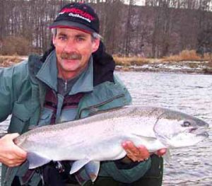 Big bright fresh Salmon River steelhead being held by my client.