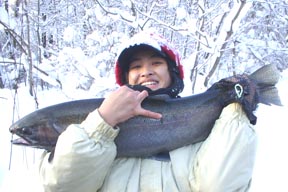 Theresa's 16 pound Salmon River steelhead! Theresa lands a 16 pound steelhead with this Salmon River drift boat fishing guide.