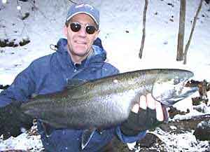 Salmon River Fishing Testimonials for Pulaski NY Guide with 31 years of Professional Guide fishing Experience. John lands his first Steelhead off the drift boat.
