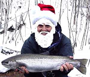 Santa fishing Steelhead from the Salmon River Pulaski NY with Salmon River Steelhead fishing guide. Santa fishing for Steelhead on the Salmon River in Pulaski NY with Salmon River fishing report Steelhead guide.