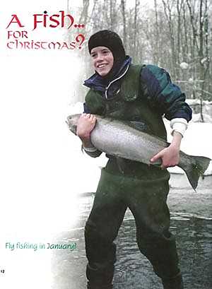 Winter Steelhead fishing Pulaski NY. Thomas with a 16 pound steelhead when Fly Fishing in January.