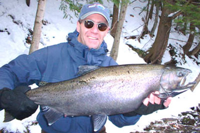 John’s 16 pd. Steelhead off the Salmon River guides drift boat! John’s honk’a off the Salmon River guide drift boat of a 16 lb. Steelhead!