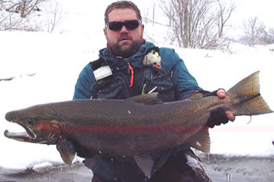 Steelhead fishing Salmon River Pulaski NY in the Spring with Capt. Bill's BIG Steelhead.