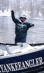 Dave off the Pulaski NY Drift Boat. Dave hamming it up on a Lake Enhanced Pulaski NY drift boat snowy day.