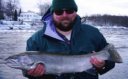 Pulaski NY drift boat Guide fishing for Steelhead on the Salmon River with Dave catching a Nice Steelhead off the drift boat during the Holiday's.