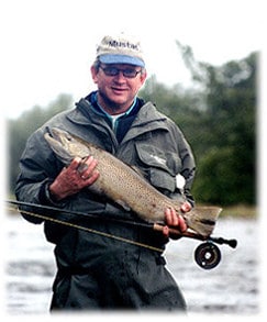 Geir Sivertzen fly fish's the Salmon River in Pulaski NY off the guide drift boat and lands a Brown Trout.