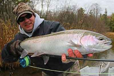 Salmon River Fly Fishing guide fishing Pulaski NY for Steelhead or Salmon. Jeff's fly fishing Steelhead off the Drift Boat.