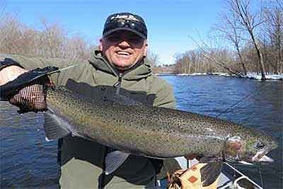 Salmon River fly fishing Pulaski NY with Steelhead and Salmon Guide. Anton's Steelhead off the drift boat.