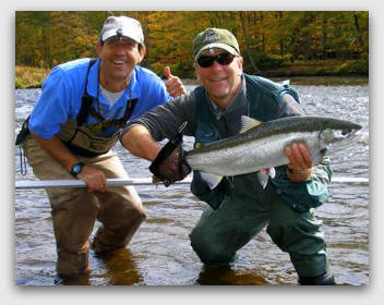 About Yankee Angler Salmon River drift boat Guide fishing Steelhead in Pulaski NY. With a very Happy Steelhead Guest!