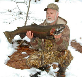 John's 16 lb. Steelhead off the drift boat. John lands a nice 16 lb. (weighed) male Steelhead off the drift boat.
